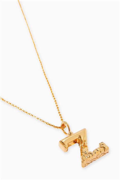 Alphabet B Necklace in Brass with Gold finish 